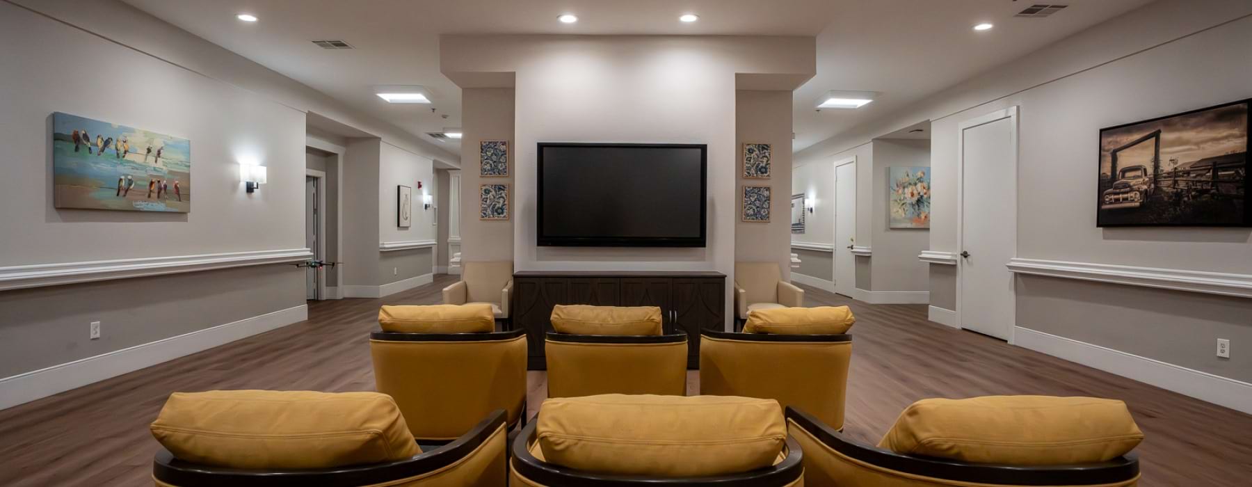 Movie theater with TV and chairs