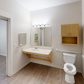 Spacious bathrooms with everything you need a bathroom with a toilet and sink